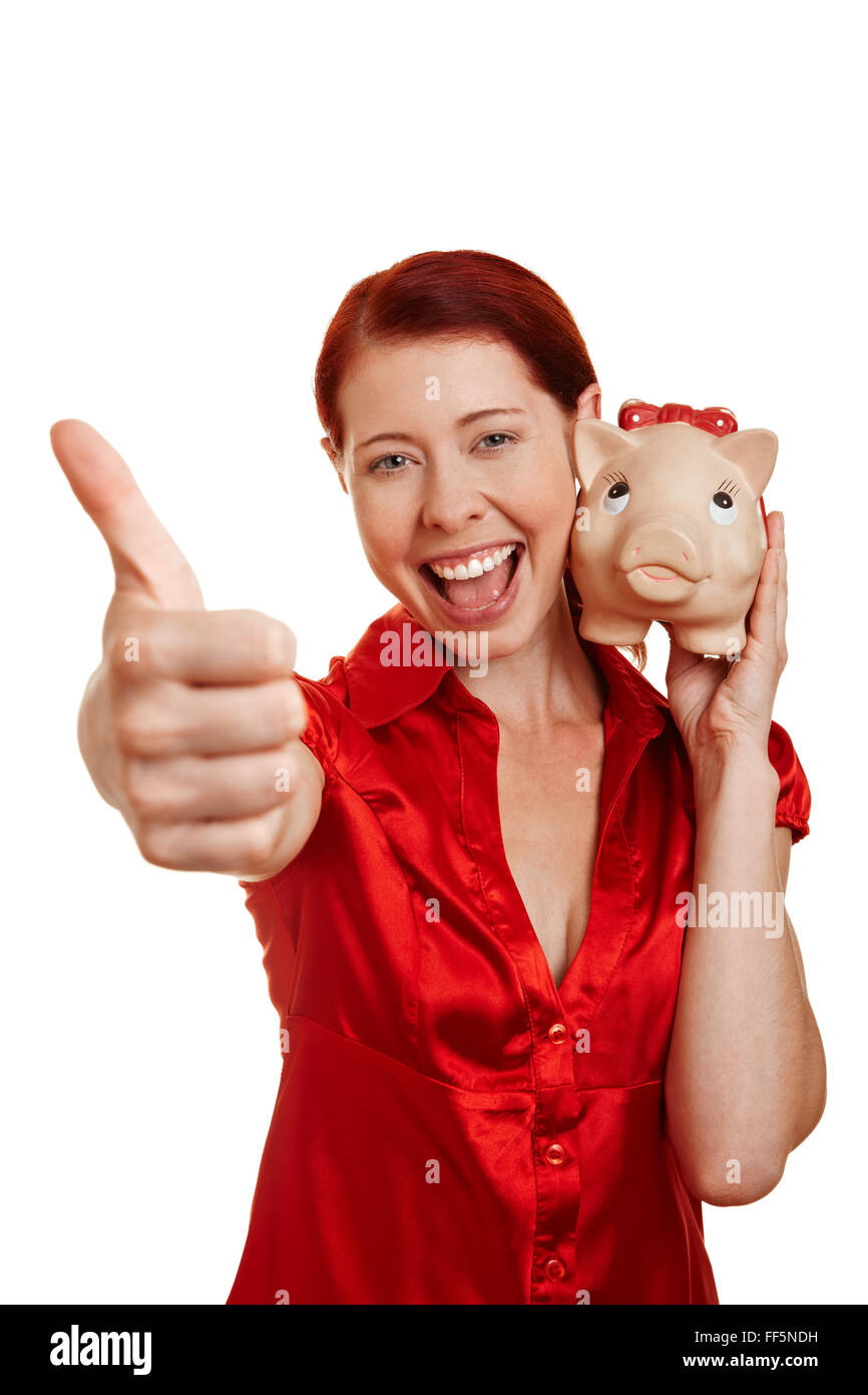 Happy young woman with piggy bank holding thumbs up Stock Photo - Alamy