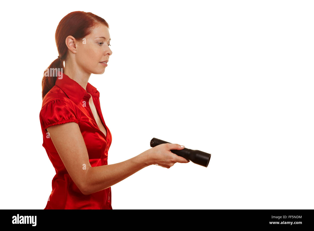 Woman holding a LED flashlight in her hand Stock Photo Alamy