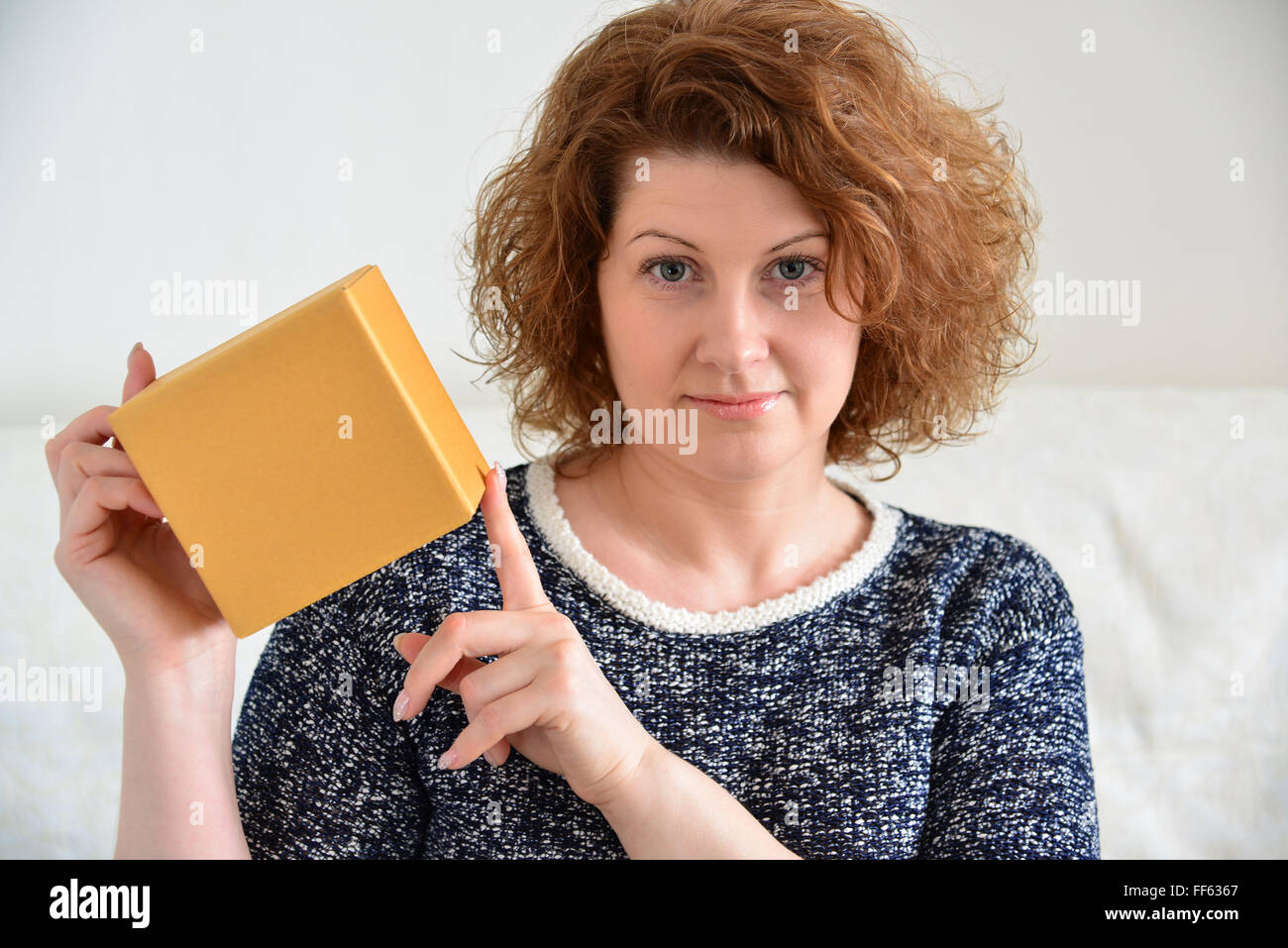 picture of attractive woman with cardboard box Stock Photo - Alamy