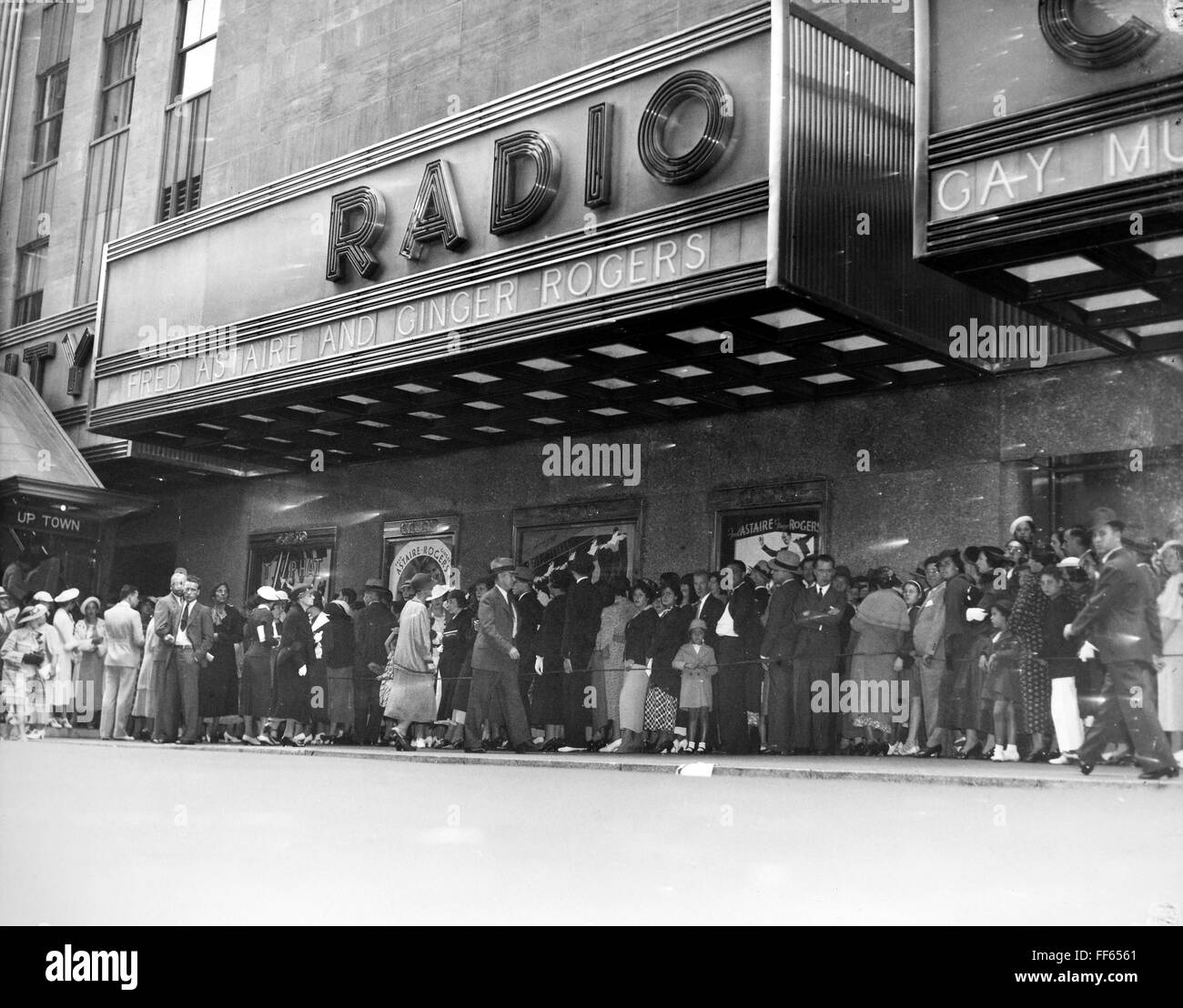 NEW YORK: RADIO CITY, 1935. /nCrowds outside Radio City Music Hall, New  York City, waiting to see the motion picture 'Top Hat,' starring Fred  Astaire and Ginger Rogers, 1935 Stock Photo - Alamy