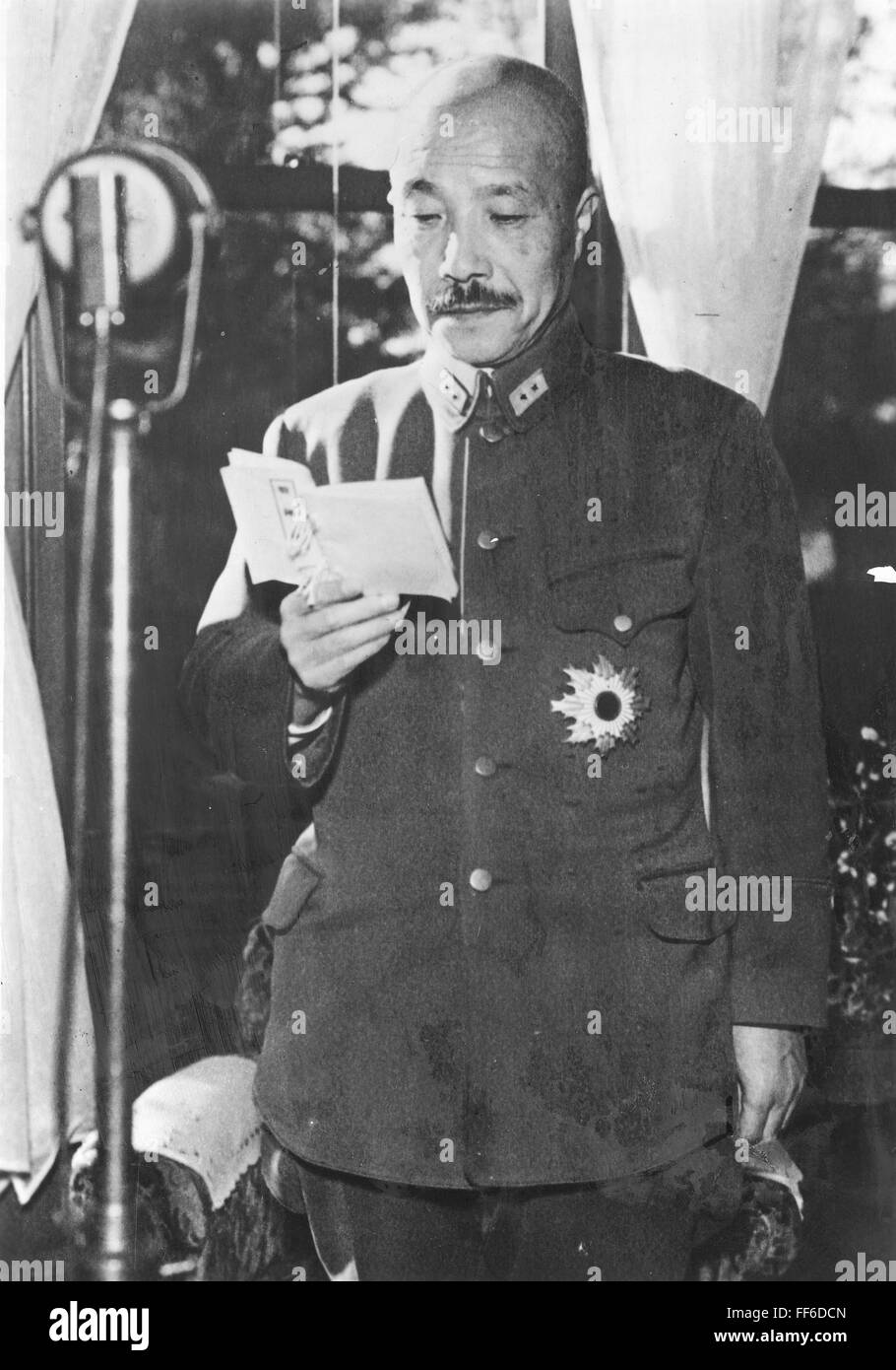 HIDEKI TOJO (1885-1948). /nJapanese general and prime minister. Photographed while prepring to deliver a radio address during World War II. Stock Photo