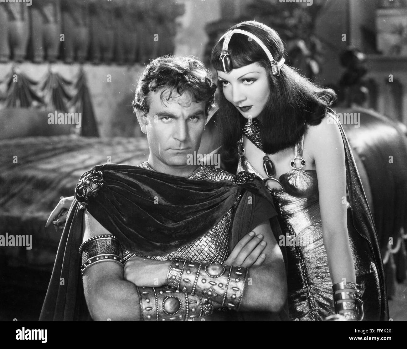 FILM: CLEOPATRA, 1934. /nClaudette Colbert as Cleopatra and Henry Wilcoxon as Marc Antony in the 1934 motion picture 'Cleopatra.' Stock Photo