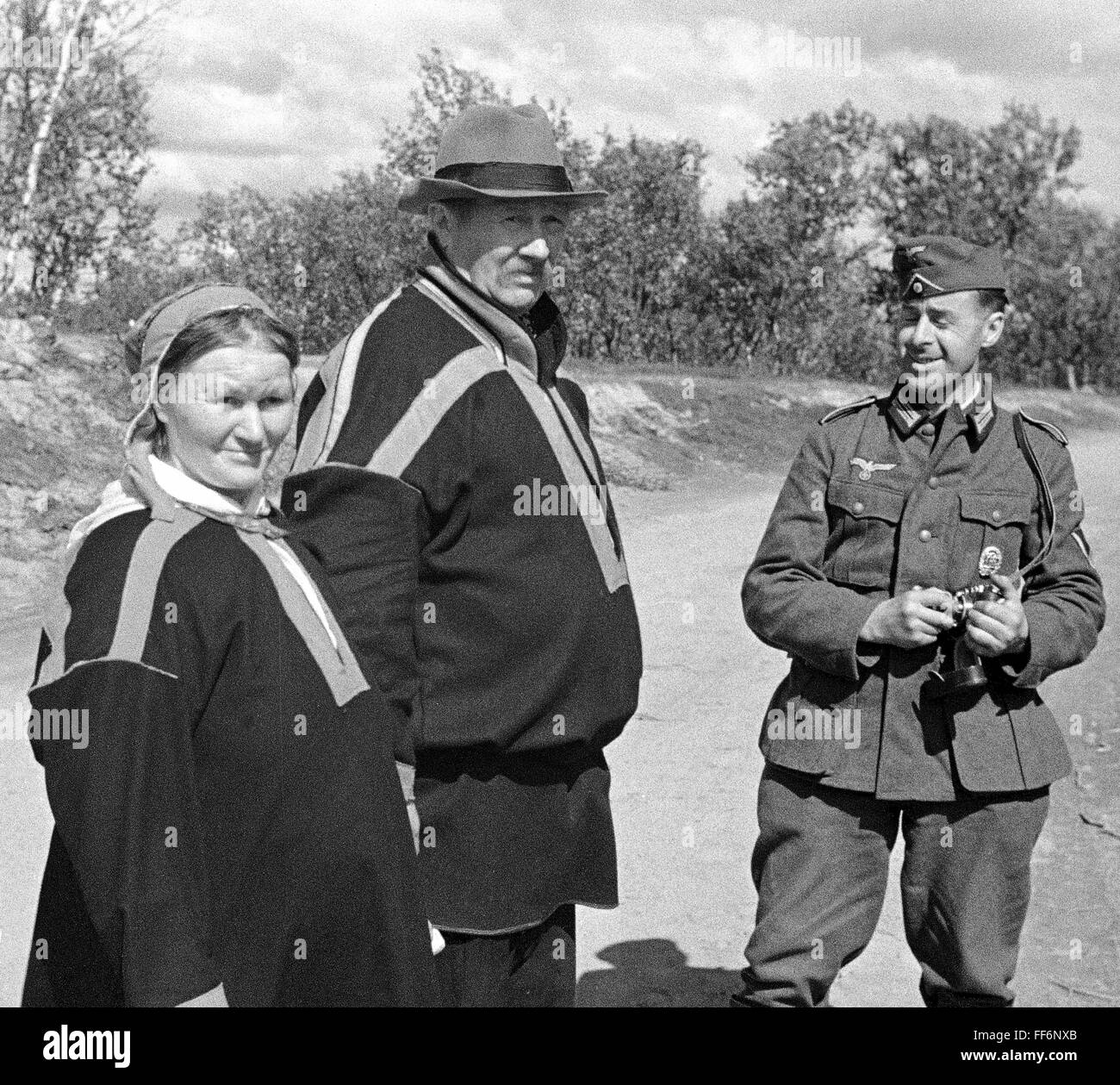events, Second World War / WWII, Norway, German occupation, Wehrmacht soldier with locals, Lapland, circa 1942, Additional-Rights-Clearences-Not Available Stock Photo