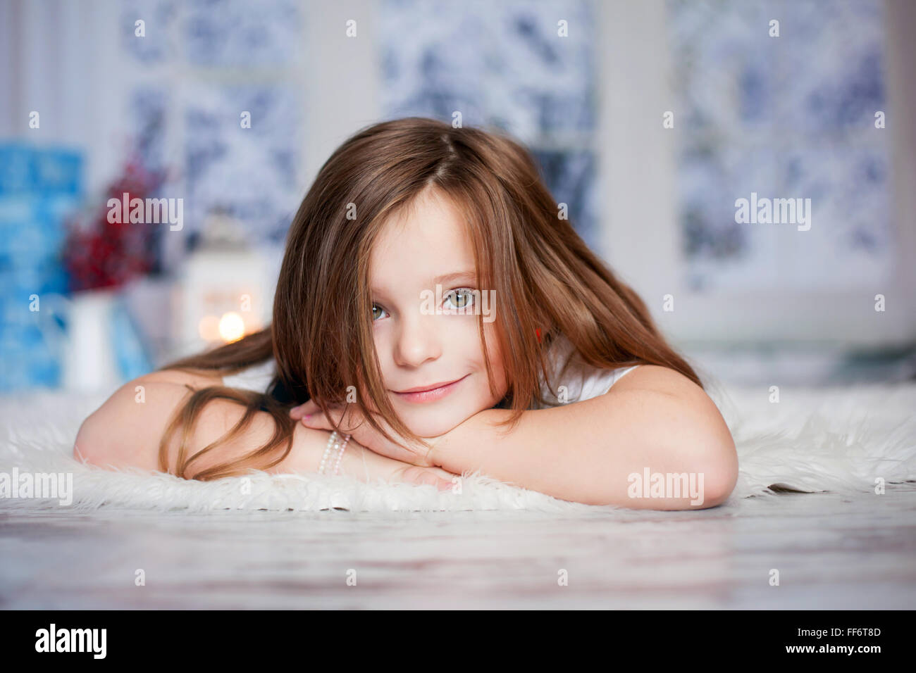 Beautiful winter close portrait of little preschool girl at home ...