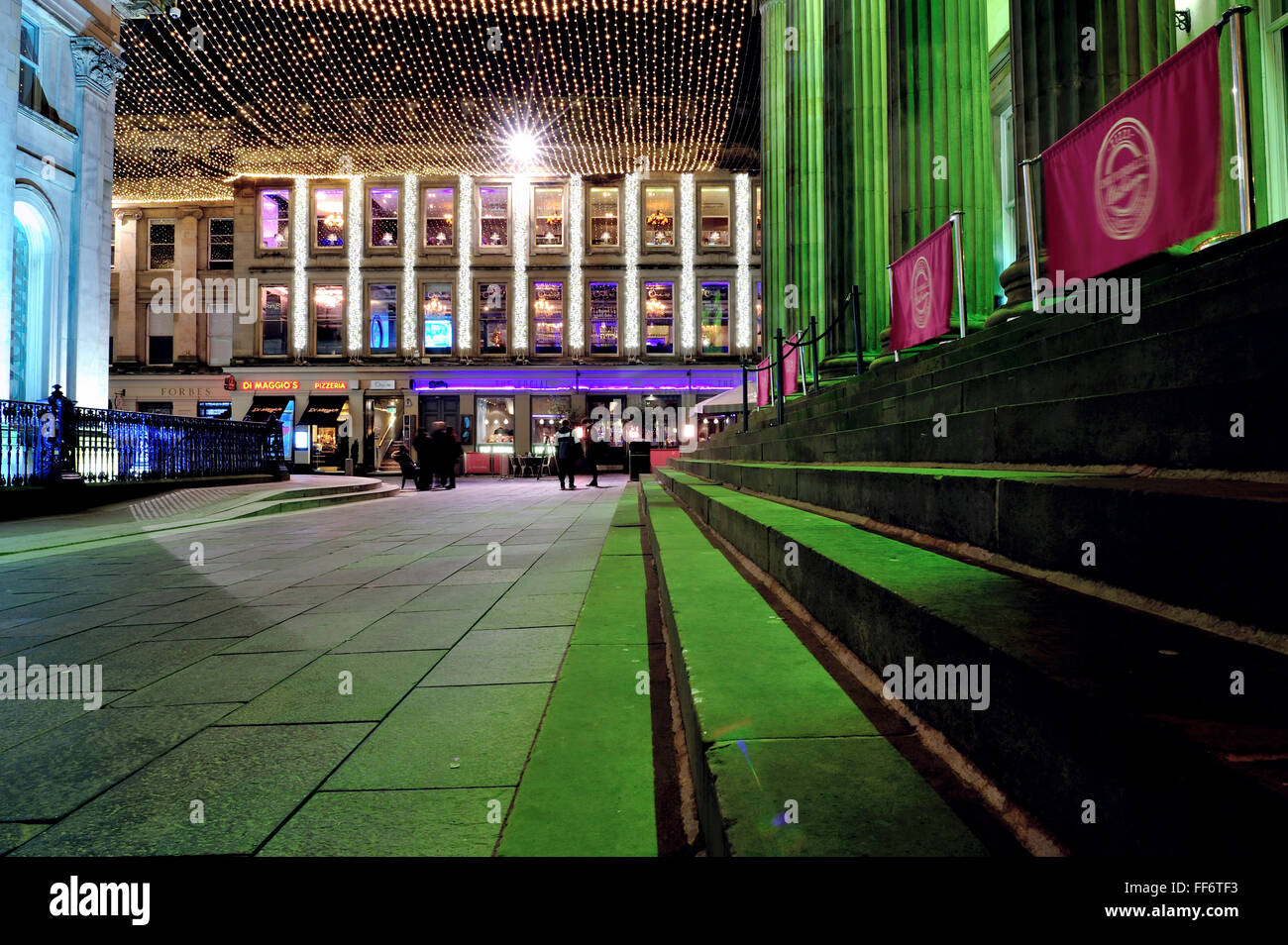 Royal Exchange Square in Glasgow city centre lit up at night. Stock Photo