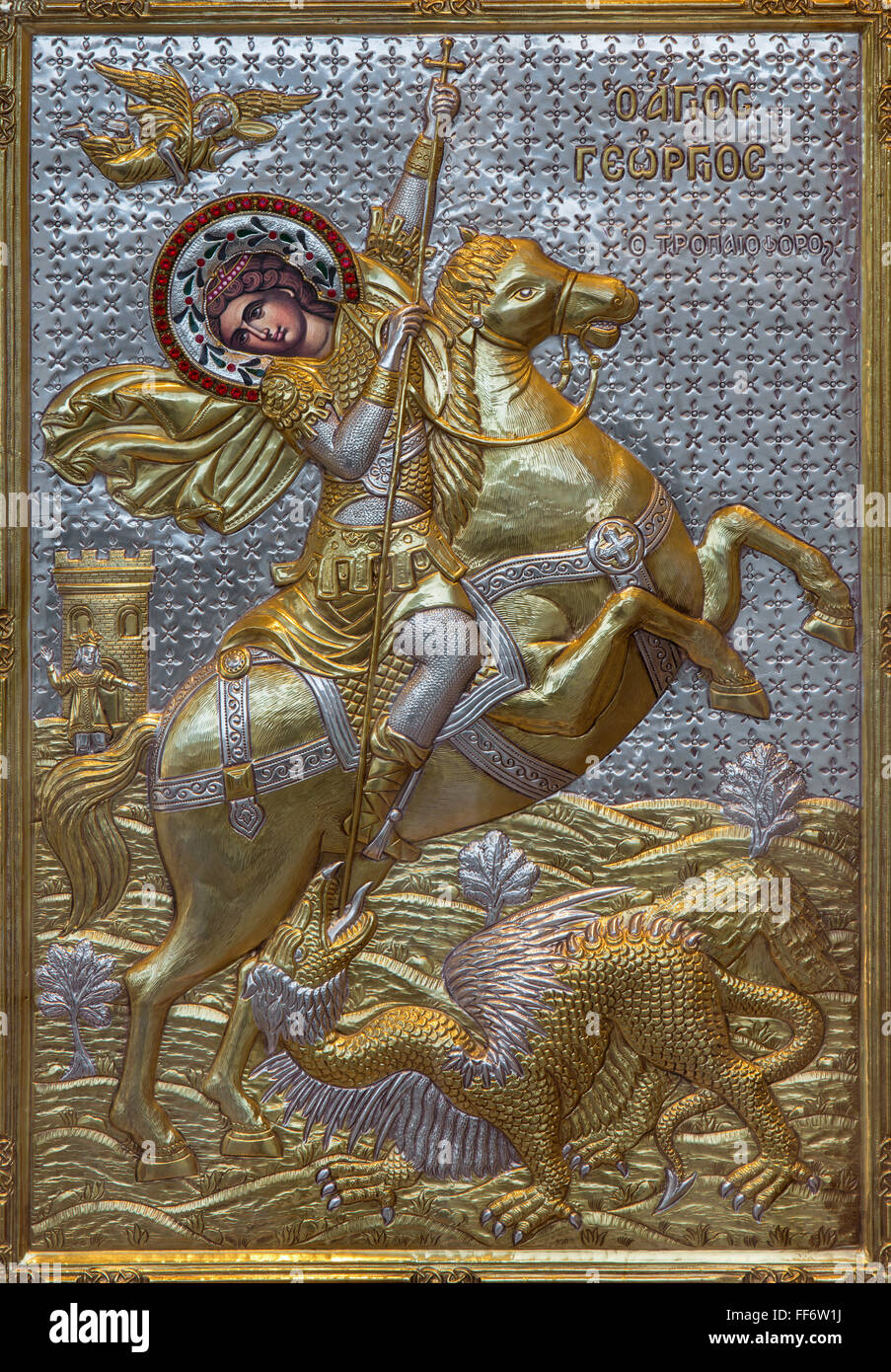JERUSALEM, ISRAEL - MARCH 4, 2015: The metal relief of duel of St. George with the Devil, by unknown artist of 20. century. Stock Photo