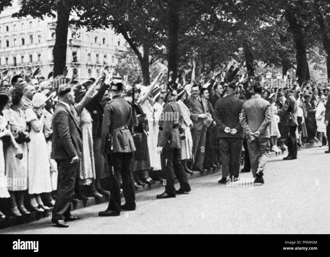 GERMANY: 1934 BLOOD PURGE. /nCrowds, awaiting a reassuring glimpse of German Chancellor Adolf Hitler, outside the Chancellery in the Wilhelmstrasse, Berlin, Germany, on 1 July 1934, following the 'blood purge' of the night before. Stock Photo