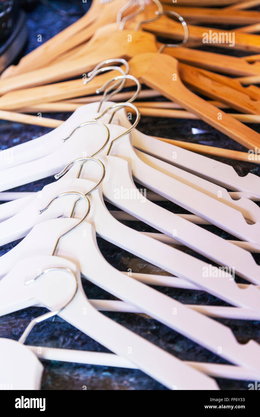 coat hangers hanger Coathangers for hanging clothes neat neatly tidy tidily Stock Photo