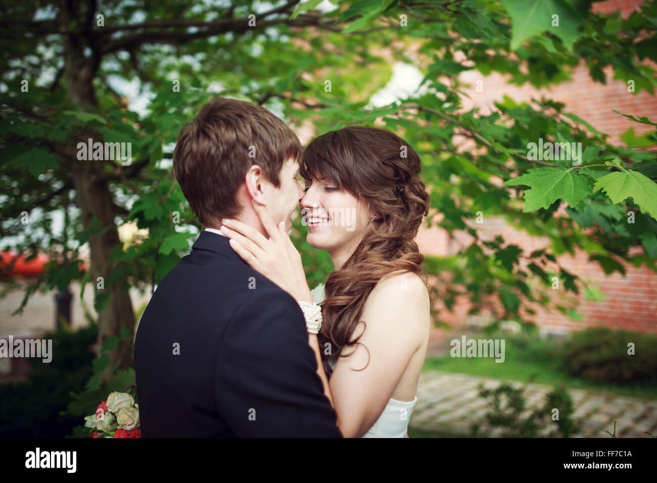 bride-and-groom-embracing-on-their-wedding-day-stock-photo-alamy