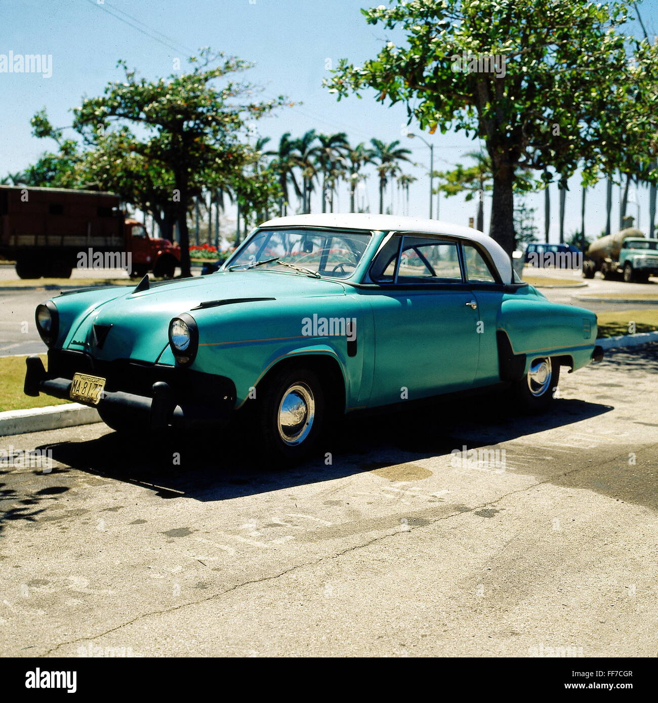transport / transportation, car, vehicle variants, Studebaker, year of construction: 1950s, 50s, 20th century, historic, historical, veteran car, classic car, vintage car, veteran cars, classic cars, vintage cars, standing, roadside, street, automobile, automobiles, car, cars, turquoise, cyan, teal, bluish green, blue-green, 1980s, Additional-Rights-Clearences-Not Available Stock Photo