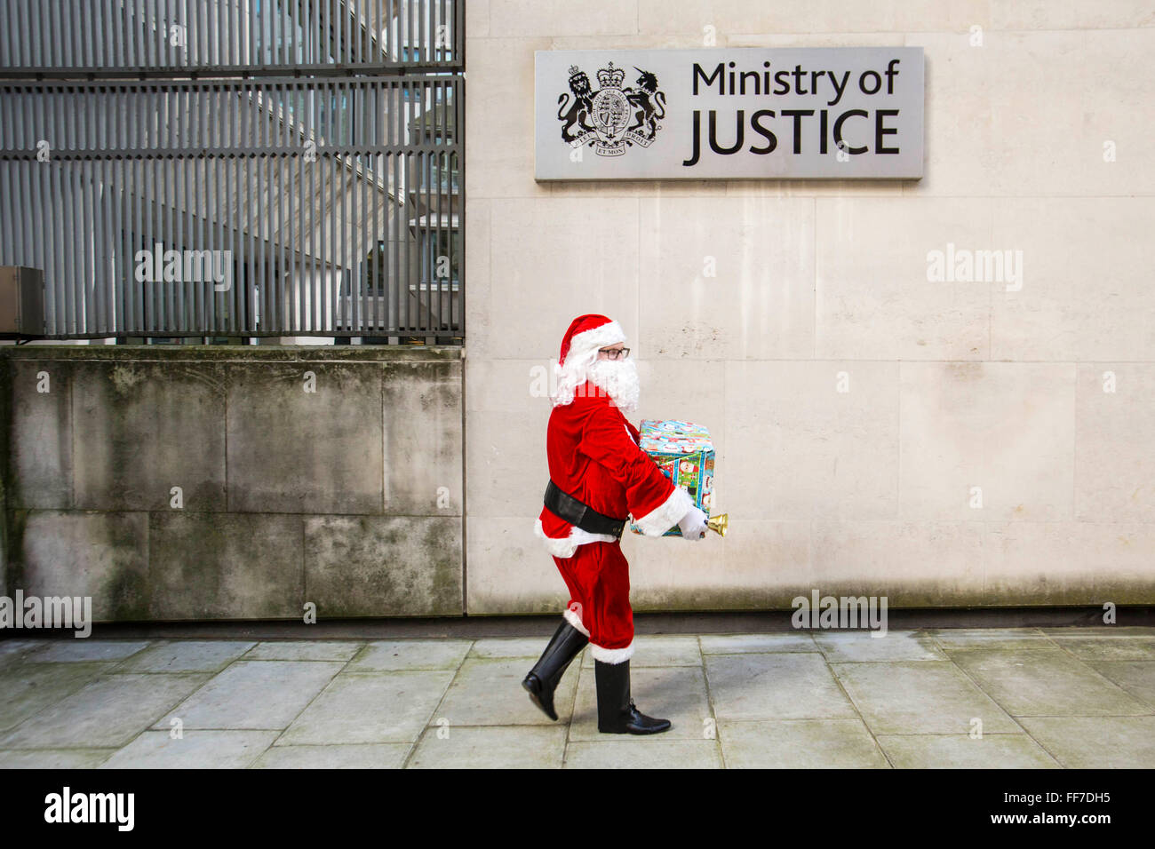 Santa delivering books for prisoners to the Ministry of Justice HQ