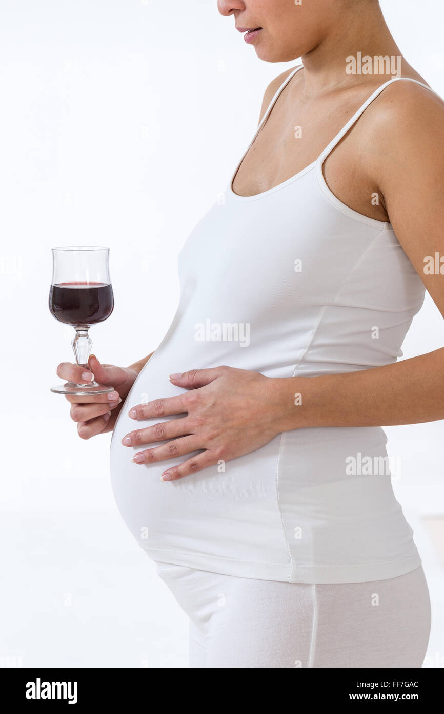 Pregnant Women Drinking Alcohol Stock Photos & Pregnant Women Drinking