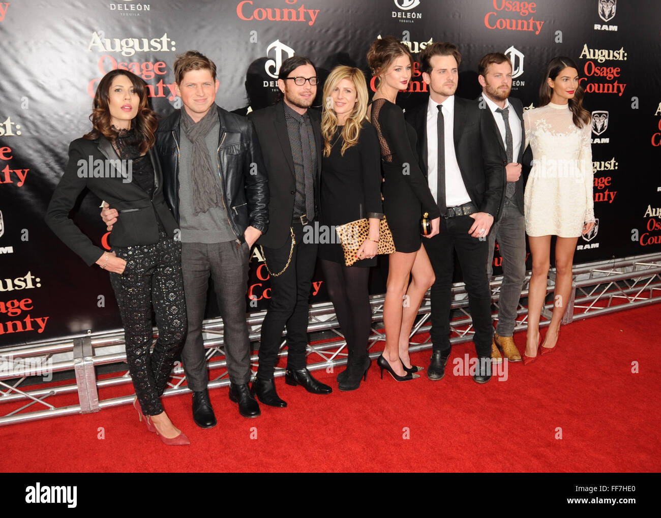 New York City, USA. 121213. Kings of Leon and wives ((L-R) Johanna Bennett,  Matthew Followill, Nathan Followill, Jessie Baylin, Martha Patterson, Jared  Followill, Caleb Followill and Lily Aldridge) at the "August: Osage