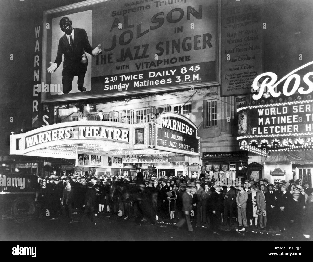 MOVIE THEATRE, 1927. /nOpening night crowds in front of Warners