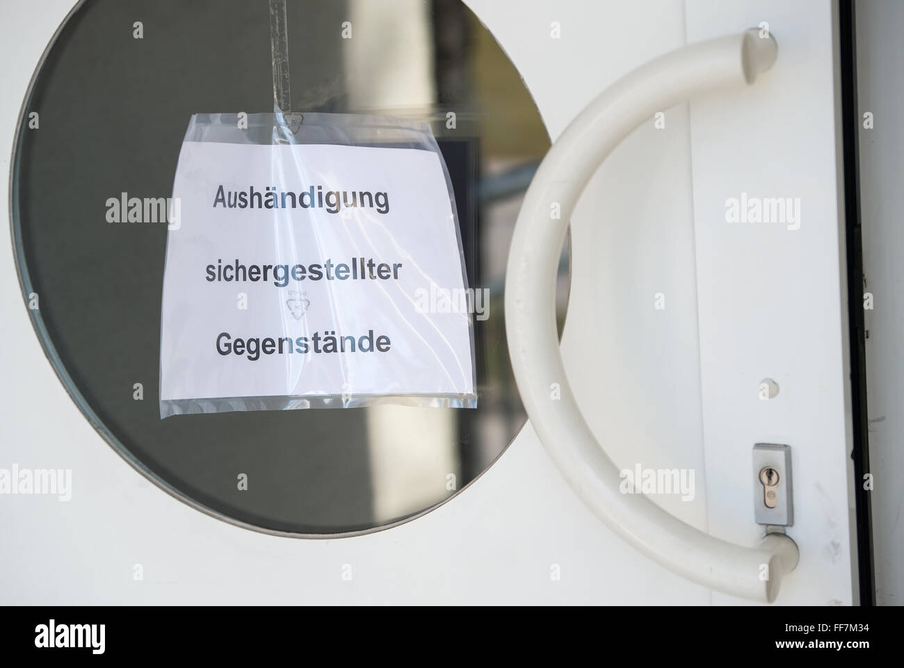 'Delivery of items' can be read on a sign on a door where personal belongings from the train crash on 09 February are set out for pick-up in a locker room at the Kolbermoore Volunteer Fire Department near Bad Aibling, Germany, 11 February 2016. The things can be picked up on 11 February 2016 between 1 and 4PM and on 12 February 2016 between 9AM and 12PM. Photo: PETER KNEFFEL/dpa Stock Photo