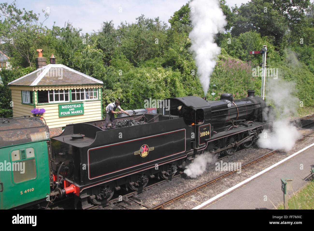 SR U Class Mogul at Medstead and Four Marks station Mid Hants preserved steam railway Stock Photo