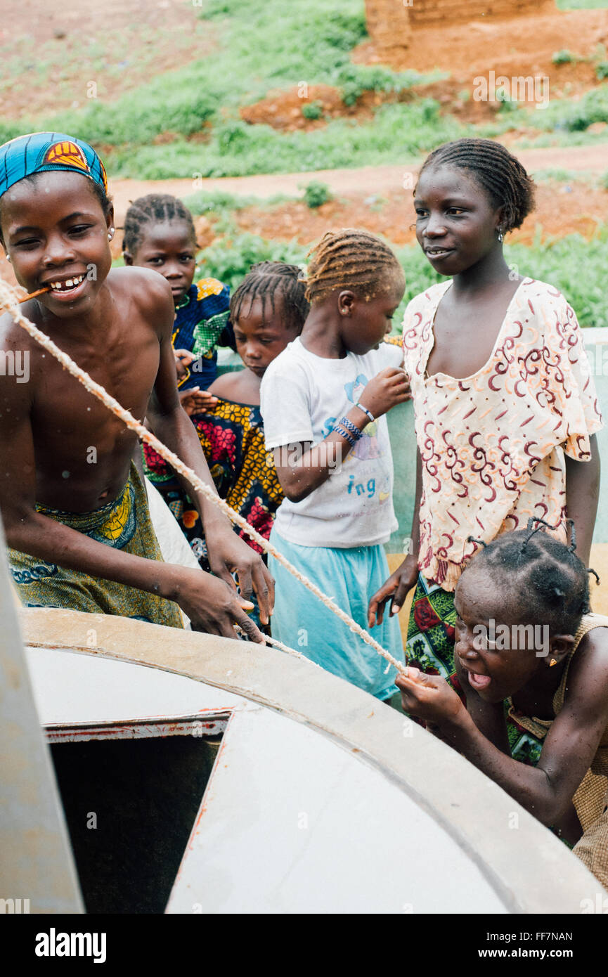 Mali, Africa - People carrying water for drinking in a village near Bamako Stock Photo