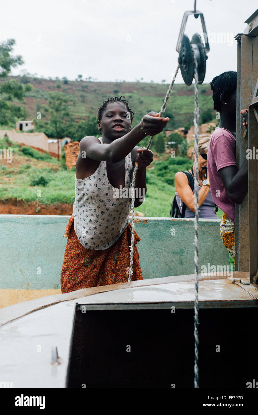 Mali, Africa - People carrying water for drinking in a village near Bamako Stock Photo