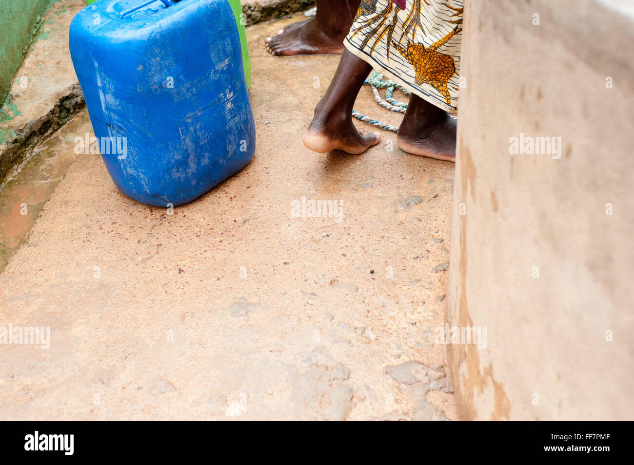 Mali, Africa - People carrying water for drinking in a village near Bamako Stock Photo