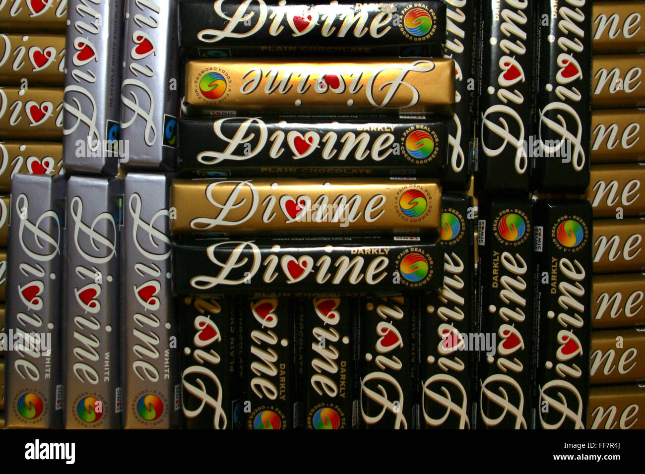 Divine organic fair trade chocolate bars, white, dark and milk Stock Photo Alamy