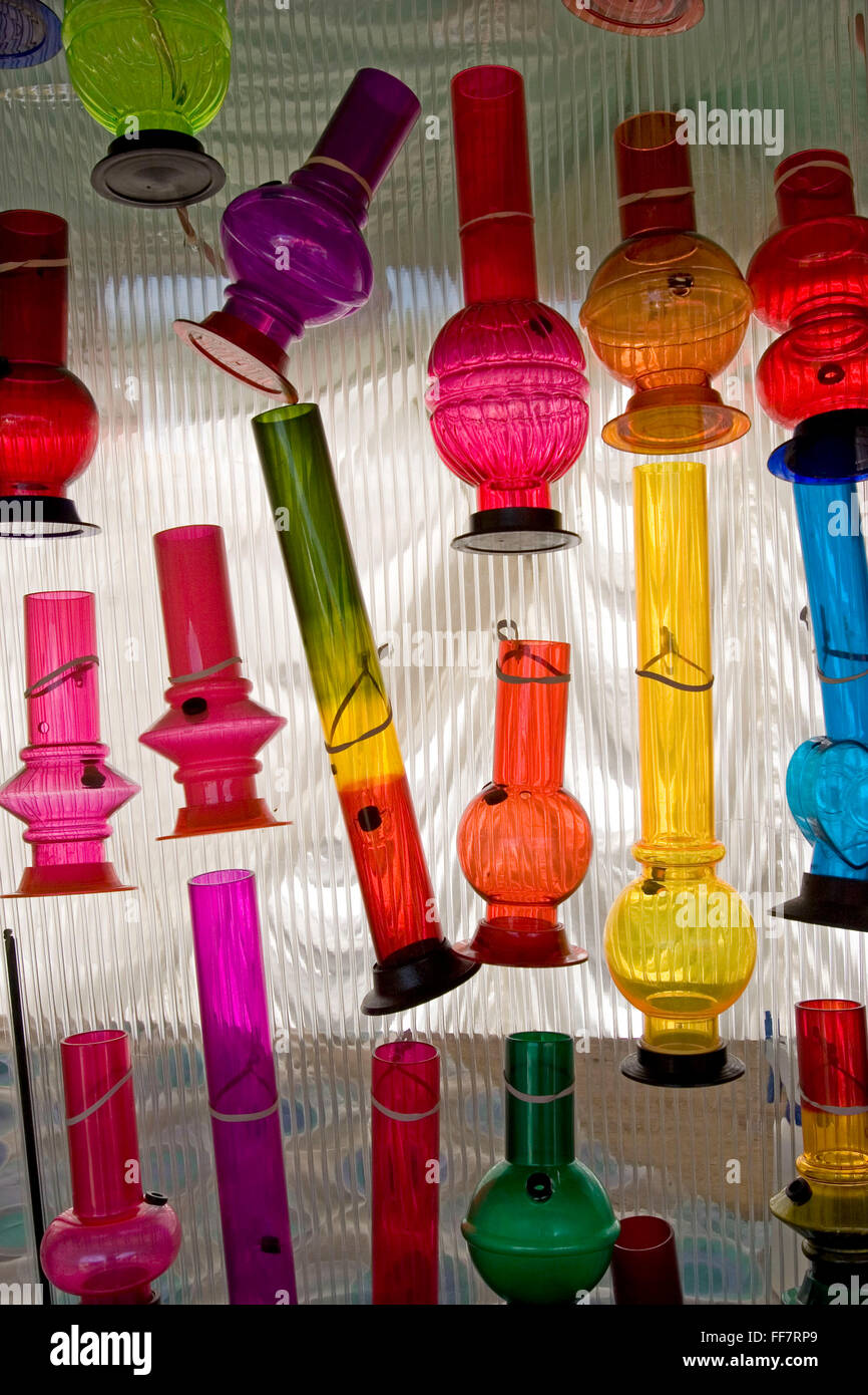 Coloured glass bongs for sale on stall at the 2005 Glastonbury festival. Stock Photo