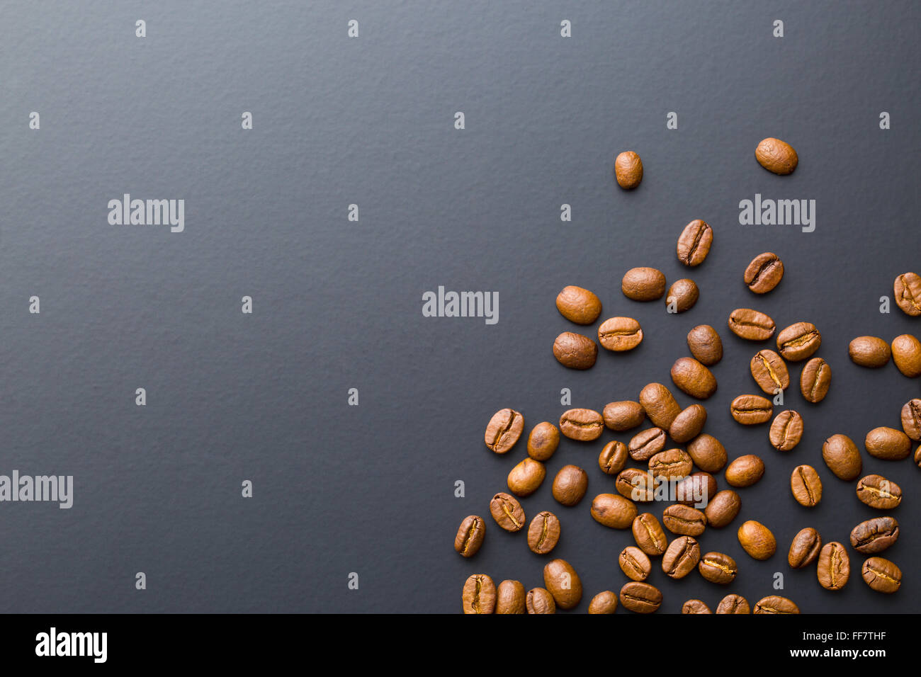 coffee beans on a black background Stock Photo - Alamy