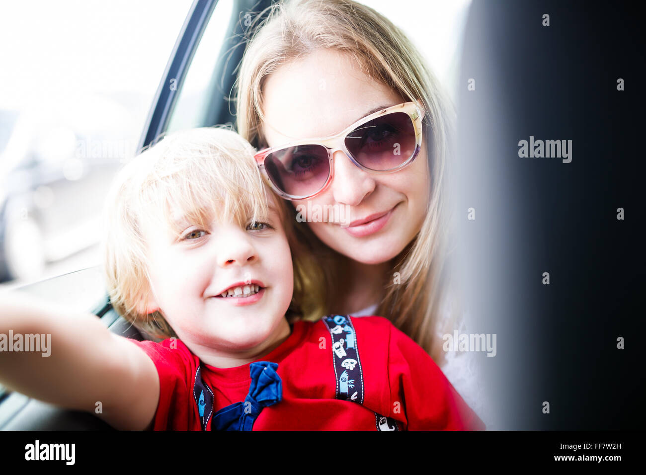 Portrain of mother and son in the car Stock Photo