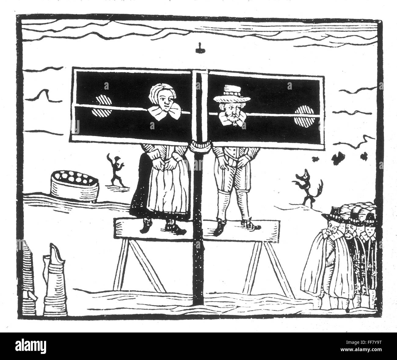 ENGLISH PILLORY. /nA man and a woman standing in a pillory while villagers stand and jeer