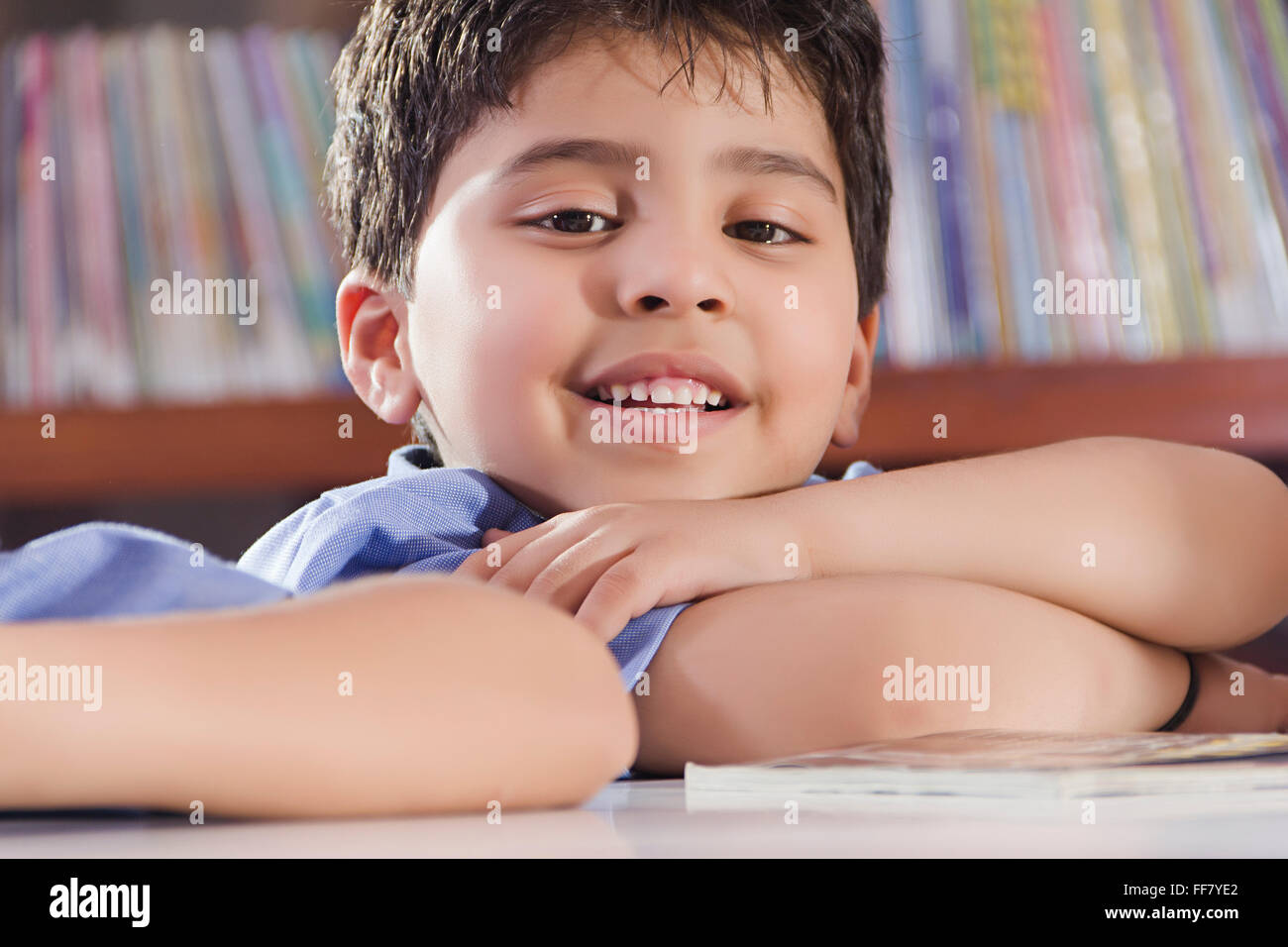 Asia Asian Asians Book Shelf Book Shelves Bookshelf Bookshelves Chin on Hand Chin on Hands Classmates Classroom Scene Classroom Stock Photo