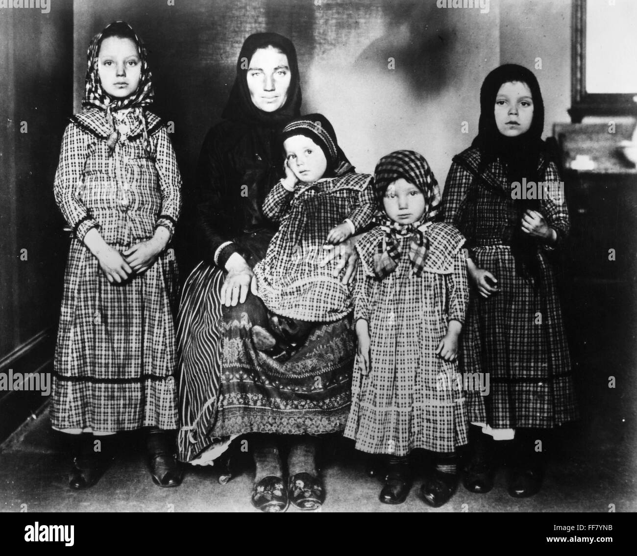 IMMIGRANTS: ELLIS ISLAND. /nAn immigrant mother and her children at ...