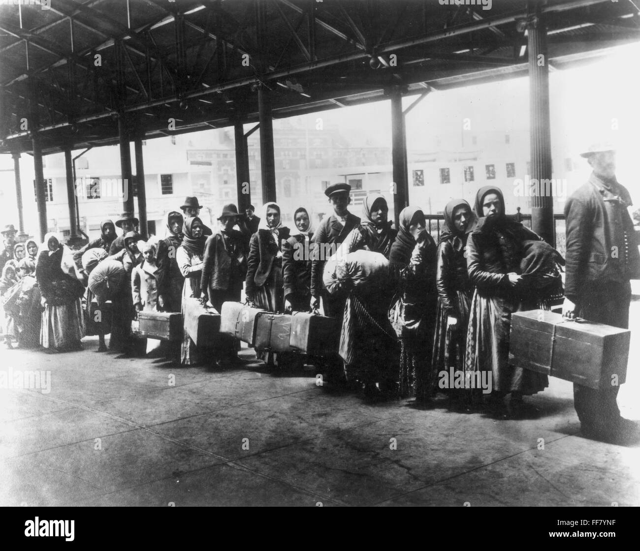 IMMIGRANTS ELLIS ISLAND. /nImmigrants arriving at Ellis Island, c1900 Stock Photo Alamy