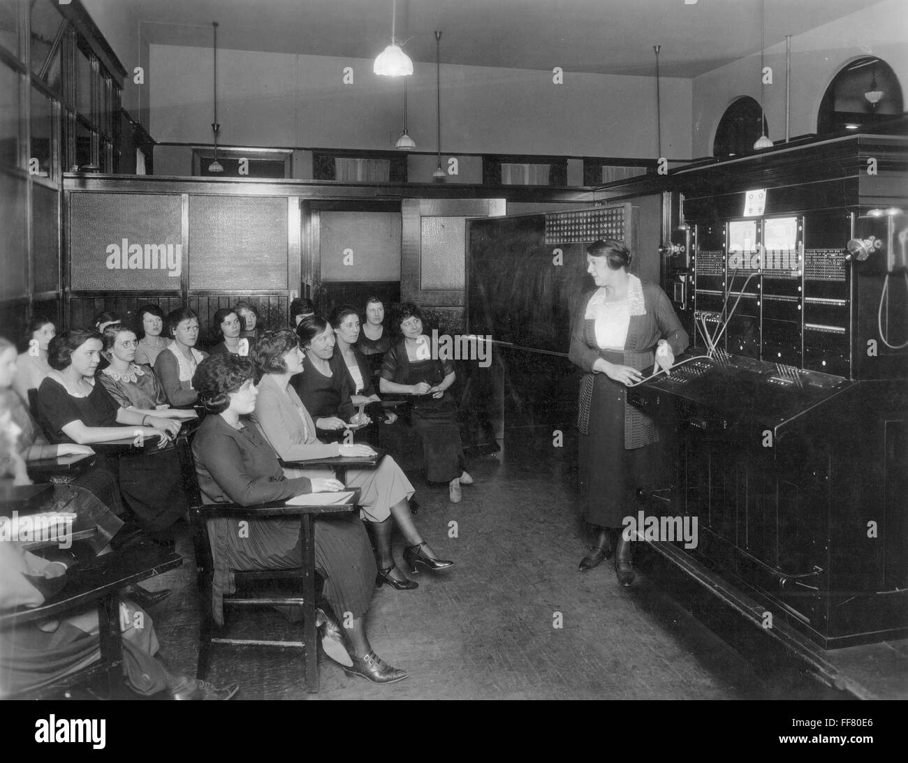 TELEPHONE EXCHANGE, 1915. /nA telephone company switchboard training