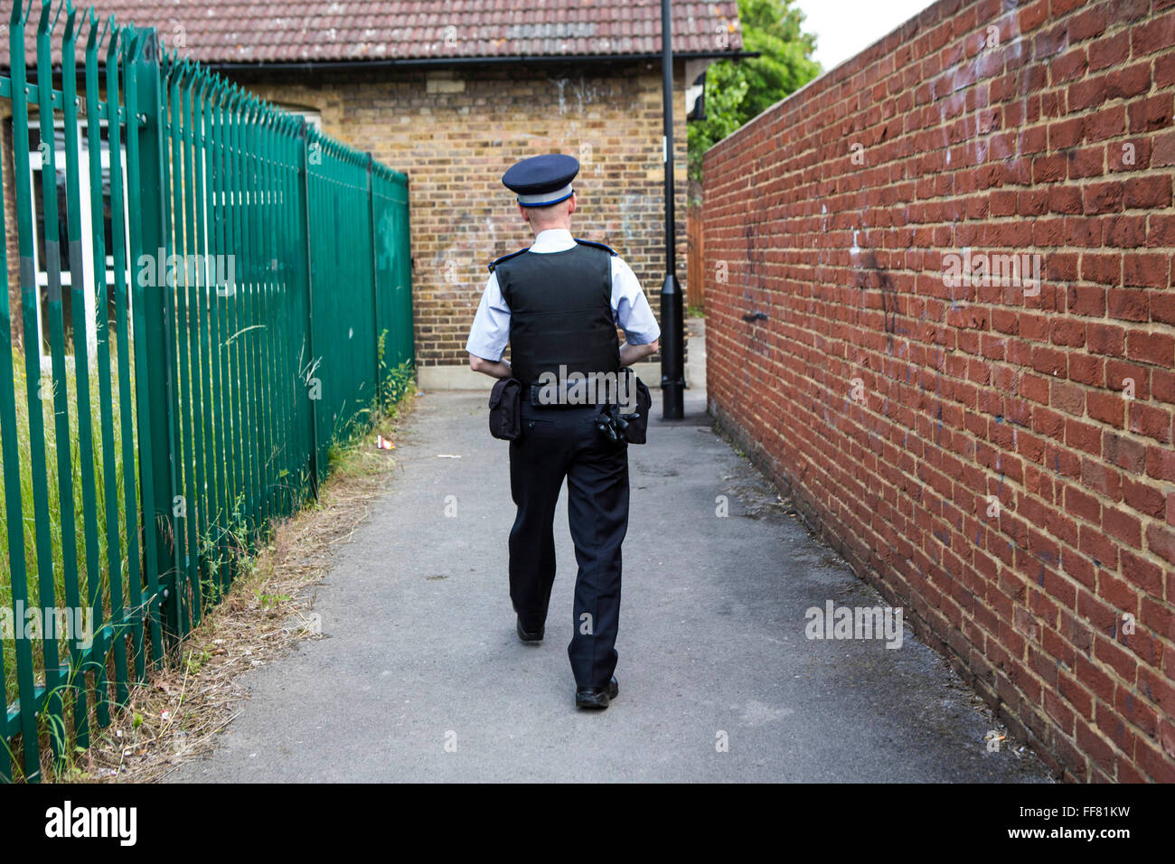 A Police Community Support Officer's (PCSO) badge on the beat in Greater London, UK. Stock Photo
