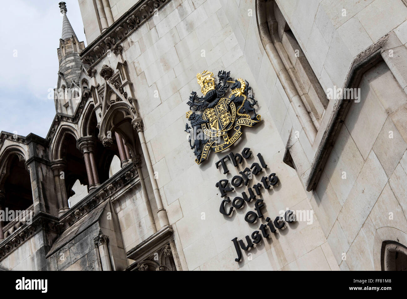 The sign outside The Royal Courts of Justice, commonly called the Law Courts, is a court building in London which houses both the High Court and Court of Appeal of England and Wales. London, UK. Stock Photo