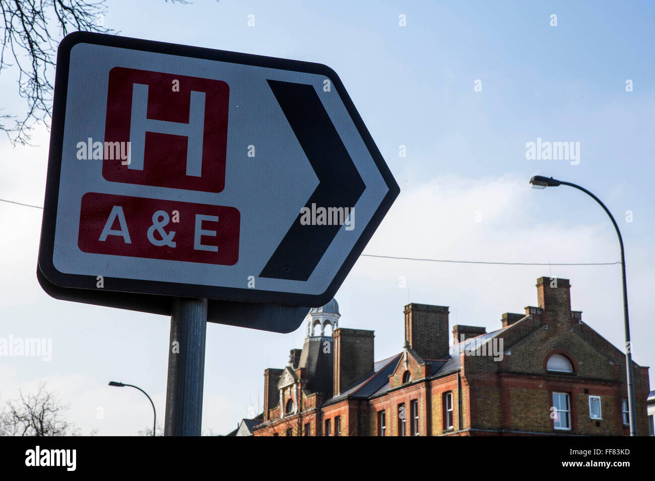 Road traffic sign directing people to an accident and emergency department in University Hospital Lewisham, London, UK. Stock Photo