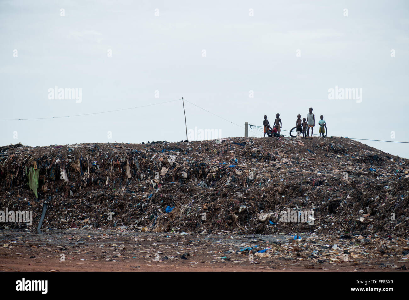 Mali, Africa - Group of black children having fun in a rubbish dump in Africa Stock Photo