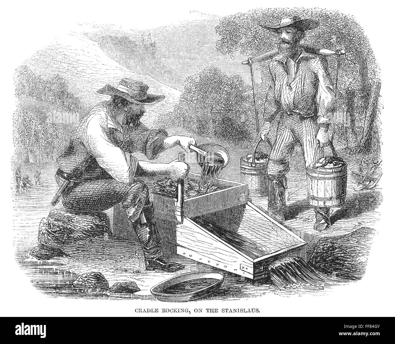 CALIFORNIA GOLD RUSH, 1860. /nA gold miner using a cradle rocker on the