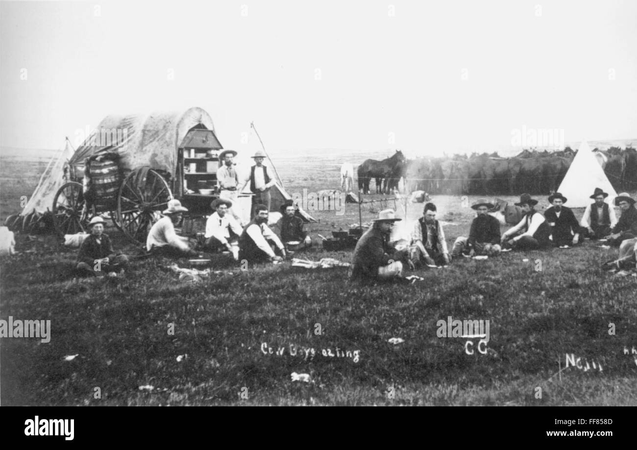 COWBOYS, c1885. /nA group of cowboys eating breakfast at the chuckwagon ...