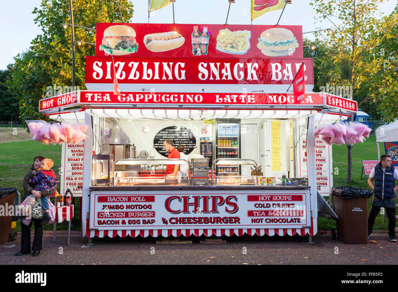 Snack bar stall or stand chips, burgers, hot dogs and other selling fast food at Goose Fair, Nottingham, England, UK Stock Photo