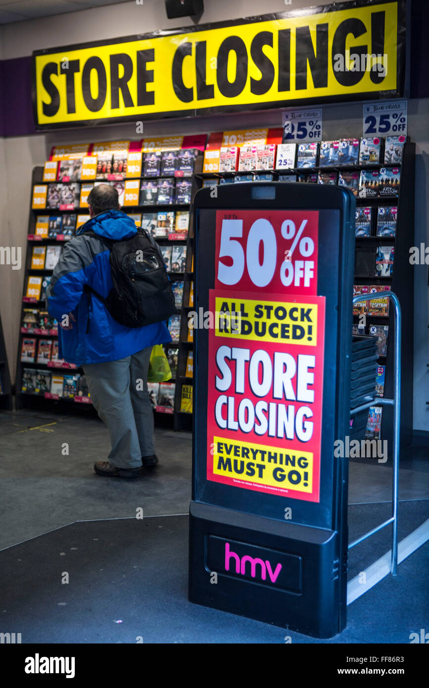 A sale sign at the shop entrance of an HMV music store near Bank, central London, United Kingdom. Due to the economic crisis in Britain the British entertainment retailing company entered into administration in January 23013. All stock is reduced as everything must go. Stock Photo