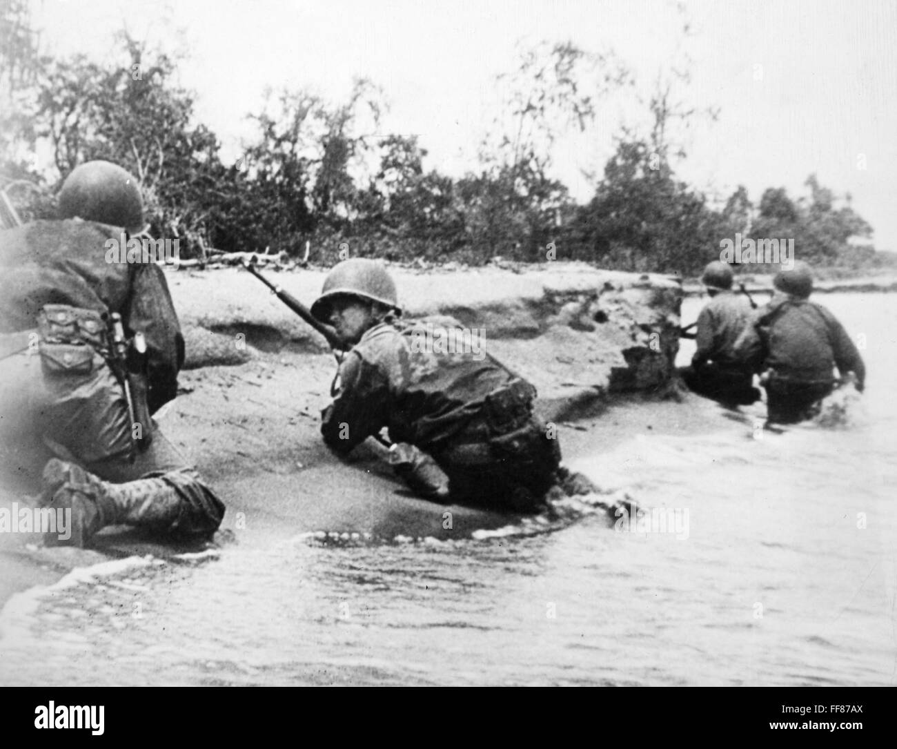 WORLD WAR II: NEW GUINEA. /nAmerican soldiers during a 'mop-up' operation on Papua New Guinea, March 1943. Stock Photo
