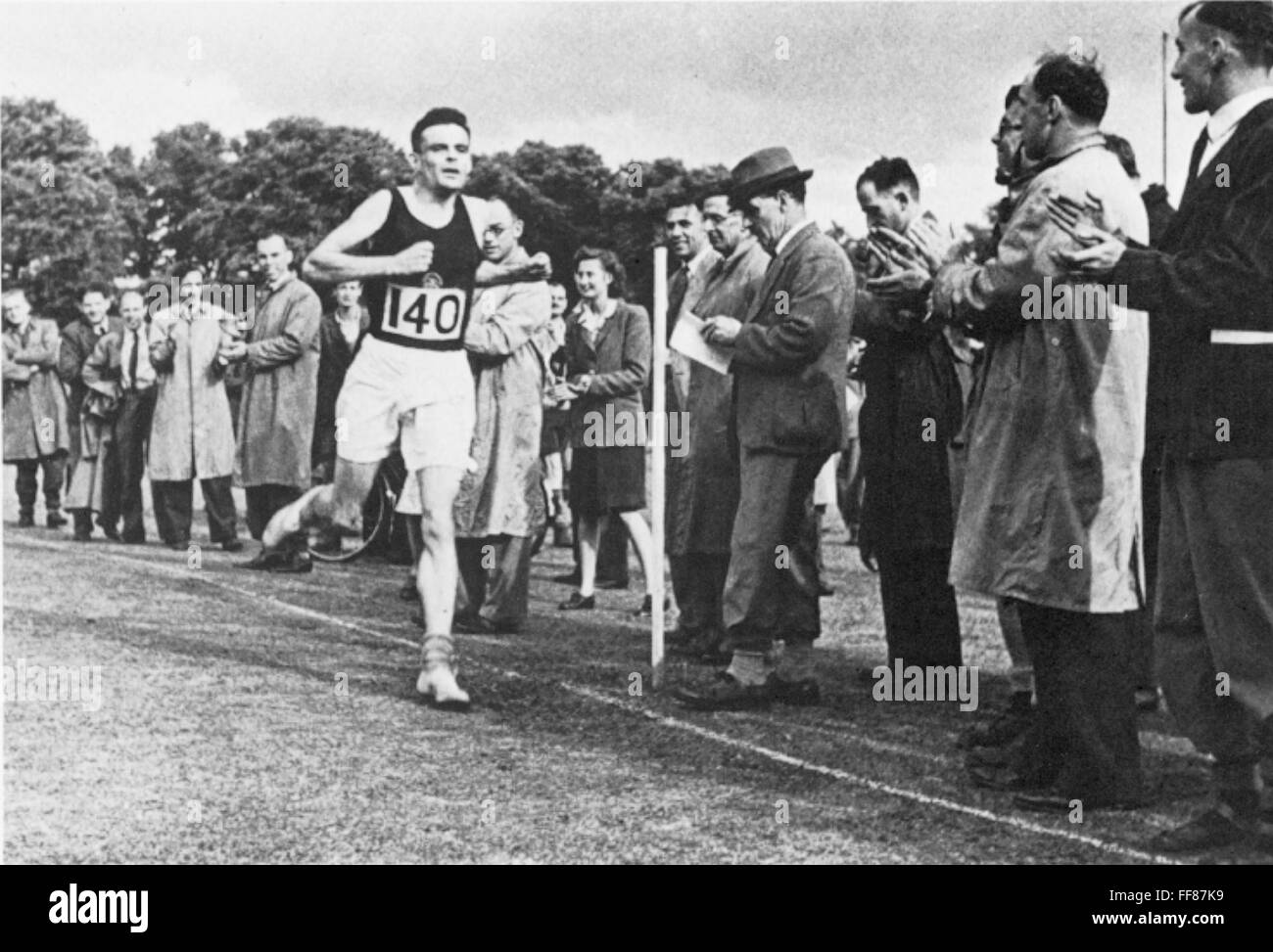 ALAN MATHISON TURING /n(1912-1954). English mathematician and logician. Finishing second in a three-mile race at Dorking, England in 1946. Stock Photo