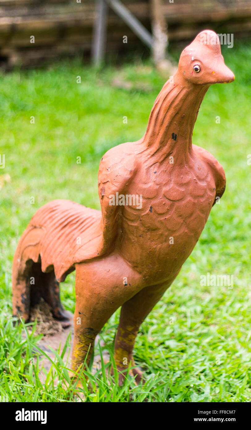 Thai chickens statue on grass Stock Photo