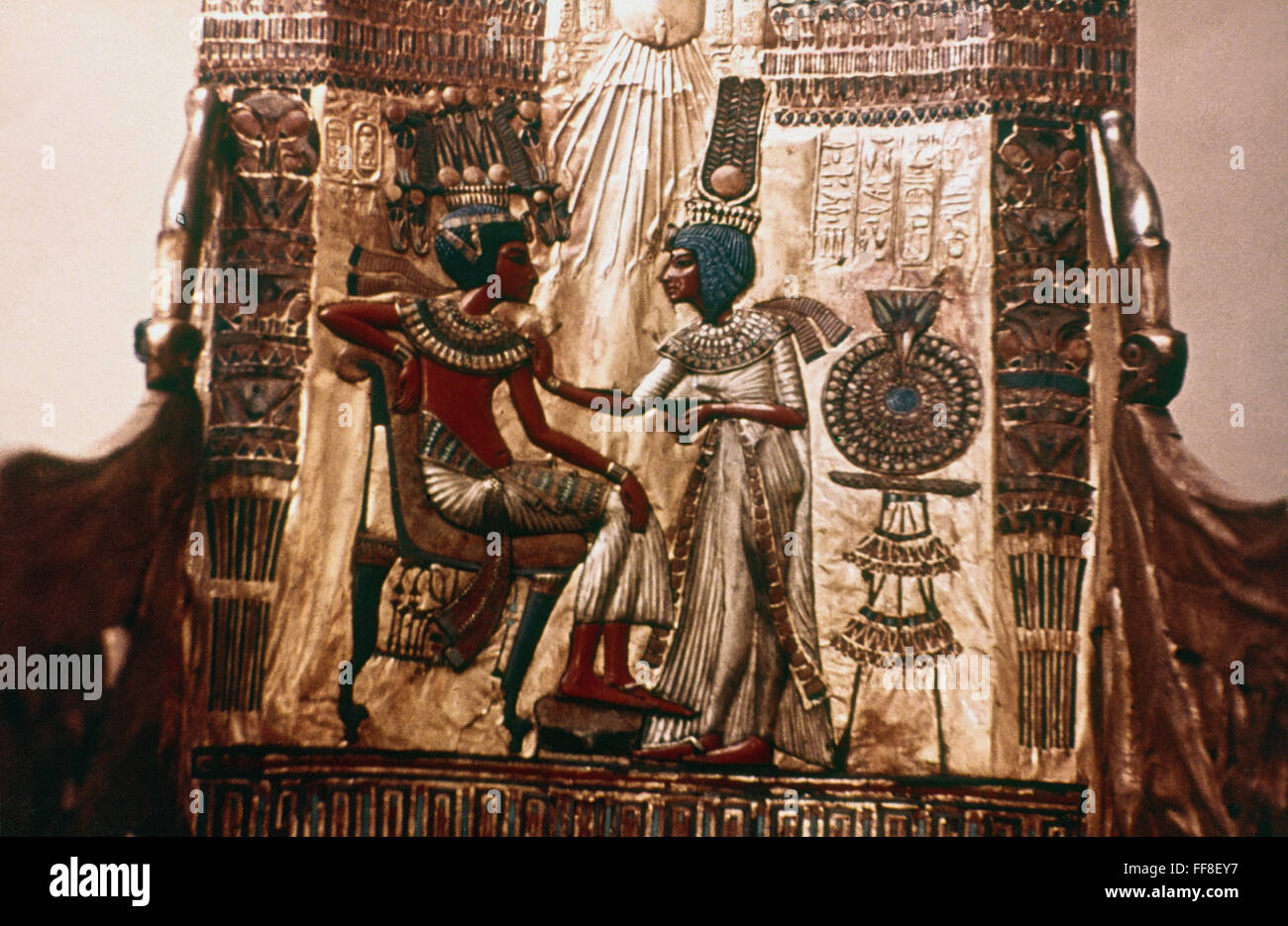 TUTANKHAMEN AND HIS QUEEN. /nDetail of gilded wooden throne. Stock Photo