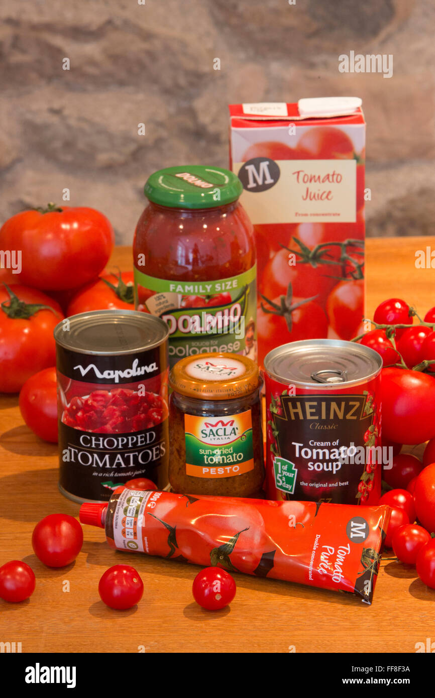 Collection of tomato products including soup, sauce, juice and puree on