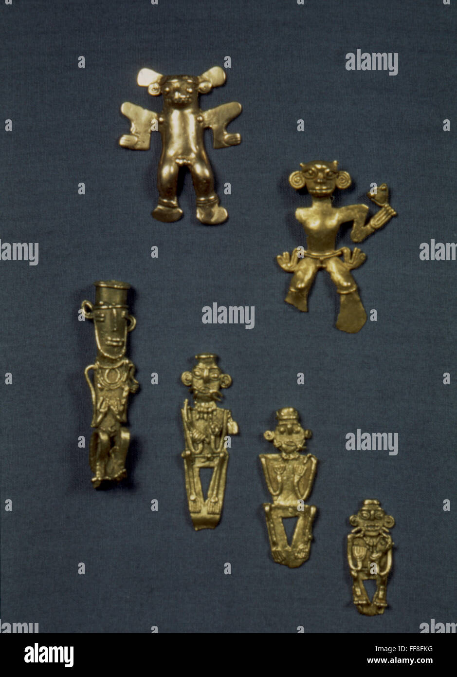 PRE-COLUMBIAN ART. /nGold bird ornaments from Bhibcha, Columbia; human ornaments from Costa Rica. Stock Photo
