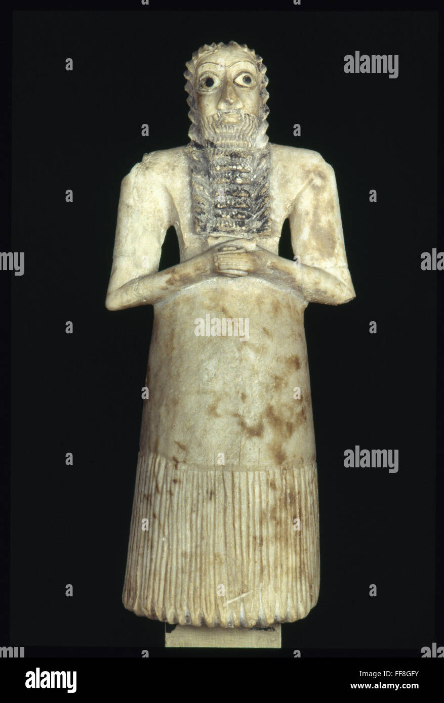 SUMERIAN ART. /nSumerian white gypsum votive statuette of a man. c2600