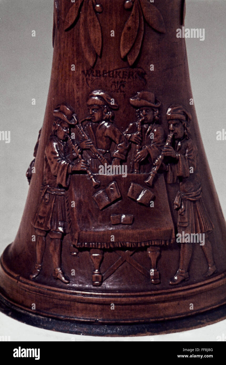 BAROQUE OBOE, 17th CENTURY. /nOboe quartet carved on bell of a baroque