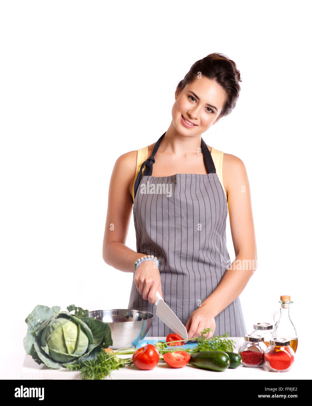 Young Woman Cooking. Healthy Food - Vegetable Salad. Diet. Dieting Concept. Healthy Lifestyle. Cooking At Home. Prepare Food. Stock Photo