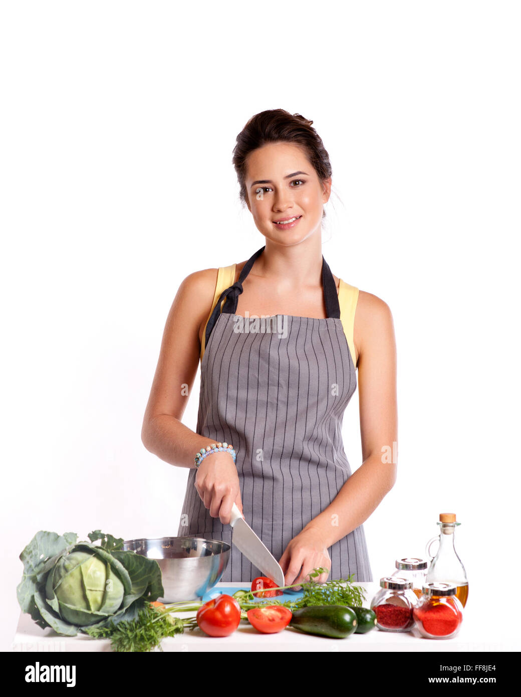 Young Woman Cooking. Healthy Food - Vegetable Salad. Diet. Dieting Concept. Healthy Lifestyle. Cooking At Home. Stock Photo